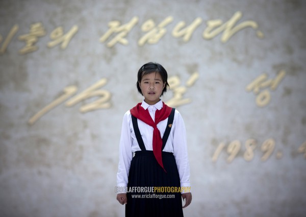 North Korean pioneer girl in the Mangyongdae children's palace, Pyongan Province, Pyongyang, North Korea