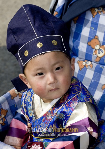 One year old North Korean toddler with the traditional hat, Pyongan Province, Pyongyang, North Korea