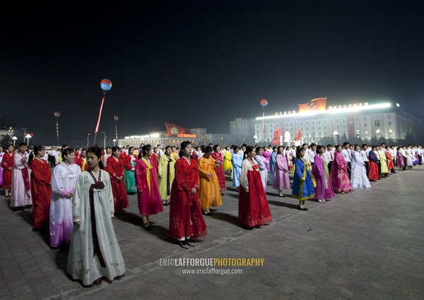 North Korean students dancing to celebrate april 15 the birth anniversary of Kim Il-sung on Kim il Sung square, Pyongan Province, Pyongyang, North Korea