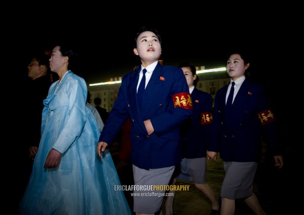 North Korean students dancing to celebrate april 15 the birth anniversary of Kim Il-sung on Kim il Sung square, Pyongan Province, Pyongyang, North Korea