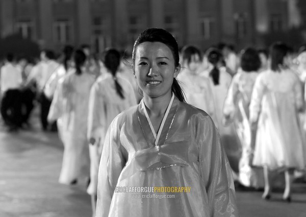 North Korean students dancing to celebrate april 15 the birth anniversary of Kim Il-sung on Kim il Sung square, Pyongan Province, Pyongyang, North Korea