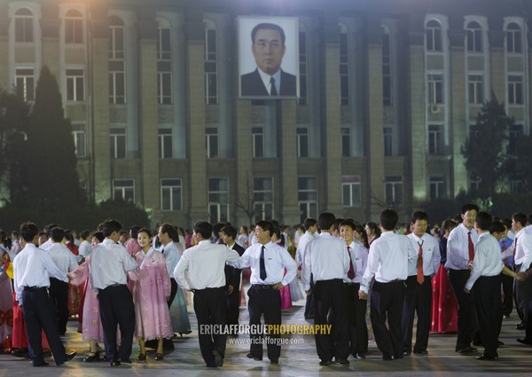 North Korean students dancing to celebrate april 15 the birth anniversary of Kim Il-sung on Kim il Sung square, Pyongan Province, Pyongyang, North Korea