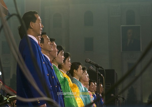 North Korean artists during a mass dance to celebrate april 15 the birth anniversary of Kim Il-sung on Kim il Sung square, Pyongan Province, Pyongyang, North Korea