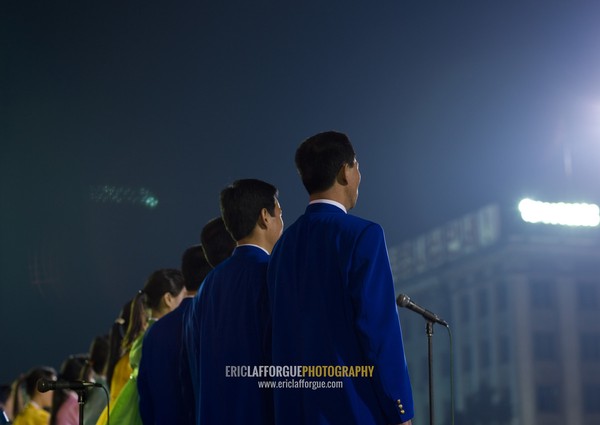 North Korean artists during a mass dance to celebrate april 15 the birth anniversary of Kim Il-sung on Kim il Sung square, Pyongan Province, Pyongyang, North Korea