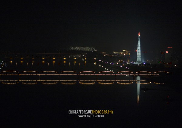 View of the Juche tower and Taedong river at night, Pyongan Province, Pyongyang, North Korea