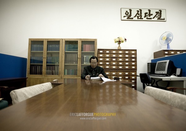 North Korean expert who answers the questions of the visitors in the Grand people's study house, Pyongan Province, Pyongyang, North Korea