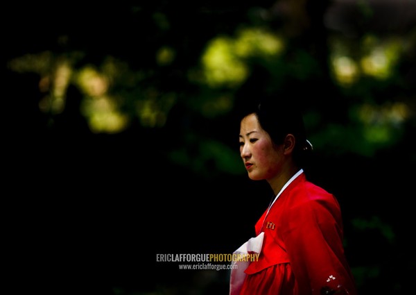 North Korean woman in red choson-ot, Hyangsan county, Mount Myohyang, North Korea