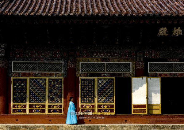 North Korean woman in choson-ot in front of Pohyon-sa Korean buddhist temple, Hyangsan county, Mount Myohyang, North Korea