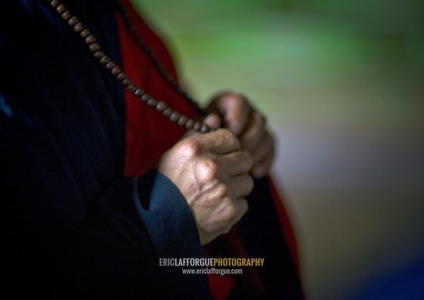 North Korean monk' hands in Pohyon-sa Korean buddhist temple, Hyangsan county, Mount Myohyang, North Korea