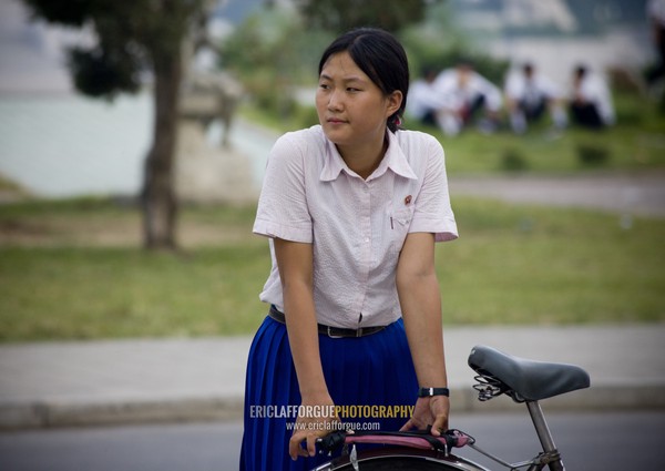 North Korean girl with her bicycle, Pyongan Province, Pyongyang, North Korea