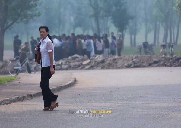 North Korean woman joining a group for collective works, Pyongan Province, Pyongyang, North Korea