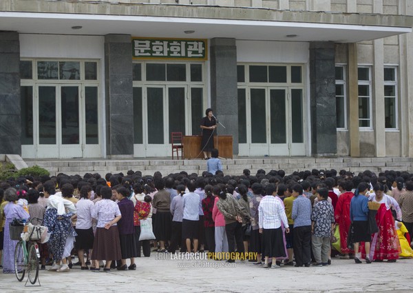 Women meeting in front of an official building, North Hwanghae Province, Kaesong, North Korea