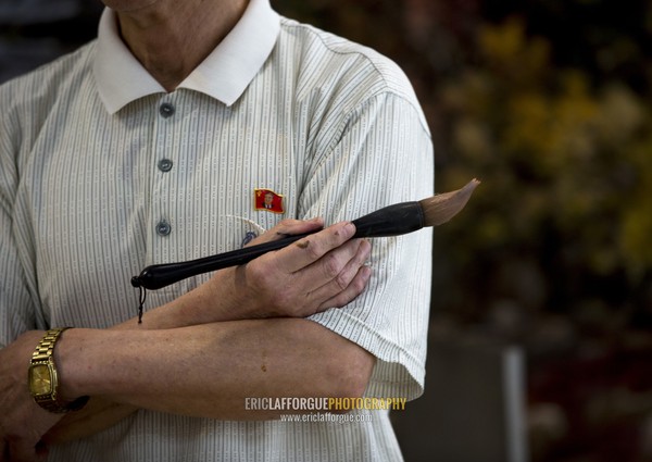 North Korean state artist in his workshop at Mansudae art studio, Pyongan Province, Pyongyang, North Korea