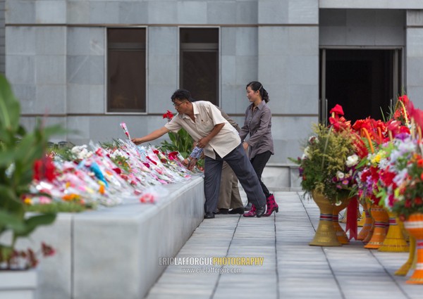 North Korean people paying respect to the Leaders in Mansudae art studio, Pyongan Province, Pyongyang, North Korea