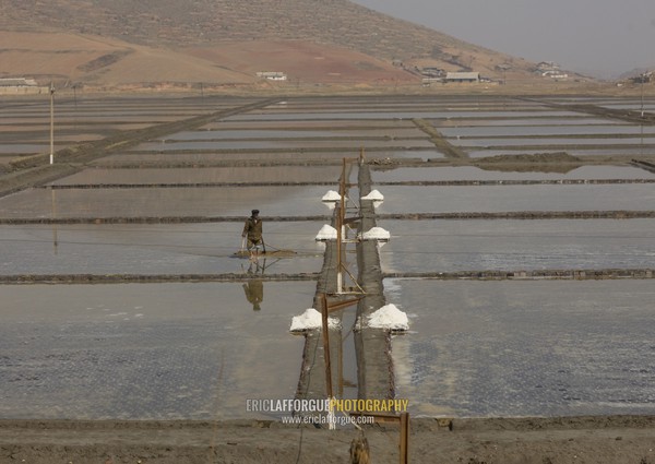 North Korean people working in salt evaporation ponds, South Pyongan Province, Nampo, North Korea