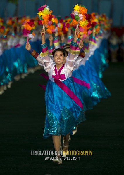 North Korean women dancing in choson-ot during the Arirang mass games in may day stadium, Pyongan Province, Pyongyang, North Korea