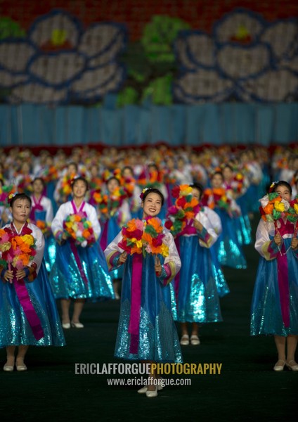 North Korean women dancing in choson-ot during the Arirang mass games in may day stadium, Pyongan Province, Pyongyang, North Korea