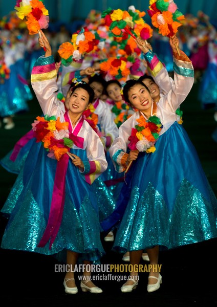 North Korean women dancing in choson-ot during the Arirang mass games in may day stadium, Pyongan Province, Pyongyang, North Korea