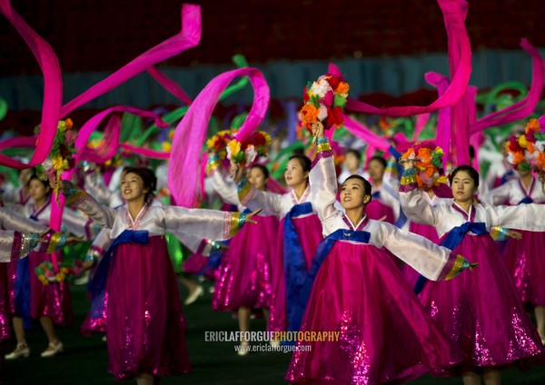 North Korean women dancing with ribbons during the Arirang mass games in may day stadium, Pyongan Province, Pyongyang, North Korea