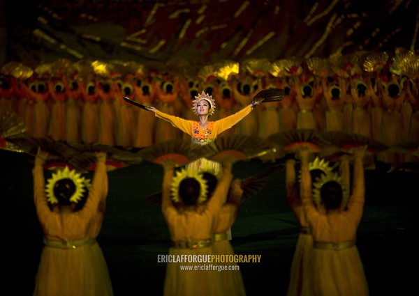 North Korean women dancing in choson-ot during the Arirang mass games in may day stadium, Pyongan Province, Pyongyang, North Korea