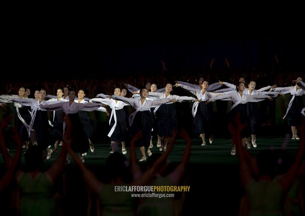 North Korean women dancing in choson-ot during the Arirang mass games in may day stadium, Pyongan Province, Pyongyang, North Korea