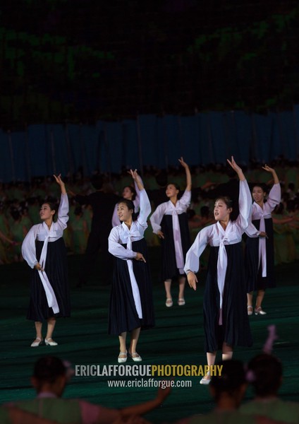 North Korean women dancing in choson-ot during the Arirang mass games in may day stadium, Pyongan Province, Pyongyang, North Korea