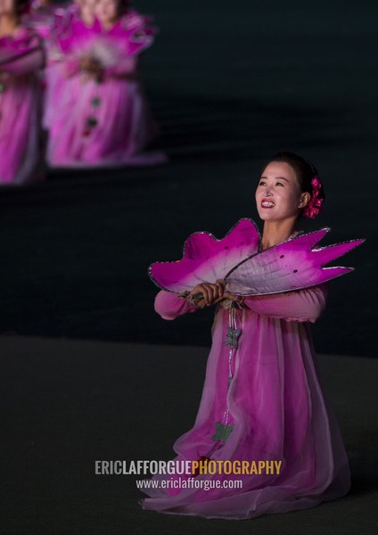 North Korean women dancing in choson-ot during the Arirang mass games in may day stadium, Pyongan Province, Pyongyang, North Korea