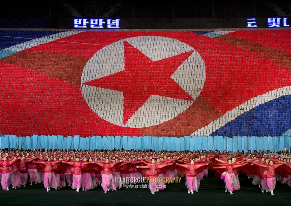 North Korean flag made by human pixels holding up colored boards during Arirang mass games in may day stadium, Pyongan Province, Pyongyang, North Korea