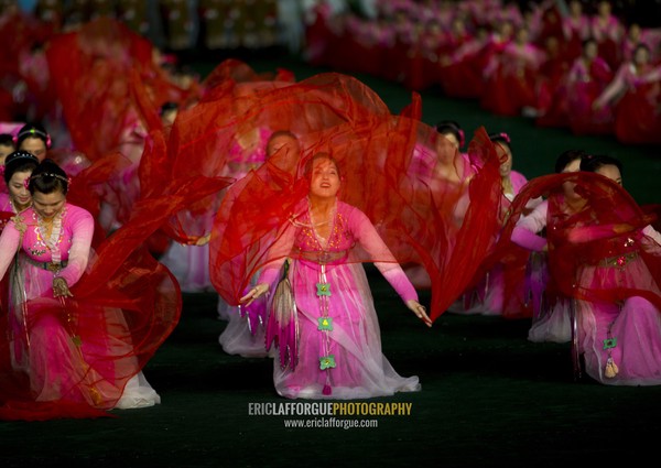 North Korean women dancing in choson-ot during the Arirang mass games in may day stadium, Pyongan Province, Pyongyang, North Korea