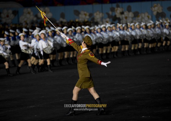 Sexy North Korean women dressed as soldiers dancing with swords during the Arirang mass games in may day stadium, Pyongan Province, Pyongyang, North Korea