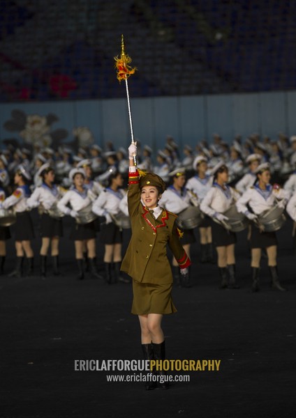 Sexy North Korean women dressed as soldiers dancing with swords during the Arirang mass games in may day stadium, Pyongan Province, Pyongyang, North Korea