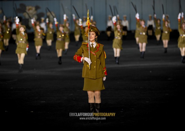 Sexy North Korean women dressed as soldiers dancing with swords during the Arirang mass games in may day stadium, Pyongan Province, Pyongyang, North Korea