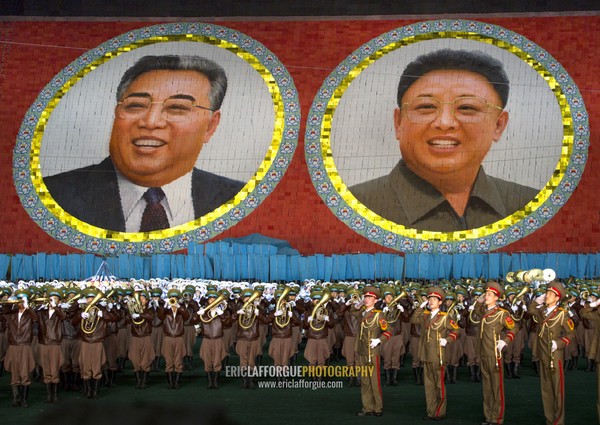 Kim il Sung and Kim Jong il portraits made by children pixels holding up colored boards during Arirang mass games in may day stadium, Pyongan Province, Pyongyang, North Korea