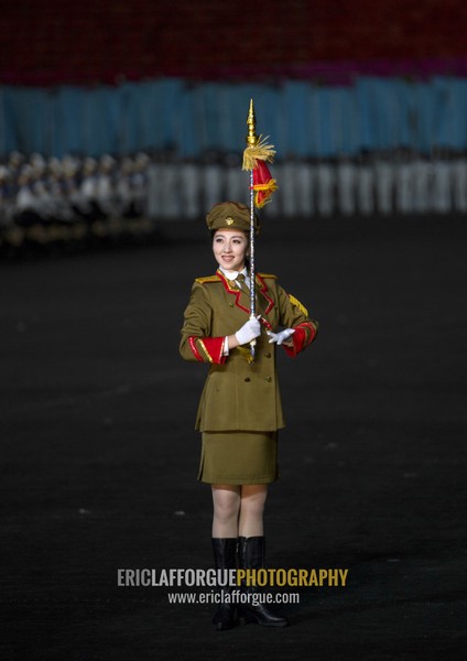 Sexy North Korean women dressed as soldiers dancing with swords during the Arirang mass games in may day stadium, Pyongan Province, Pyongyang, North Korea