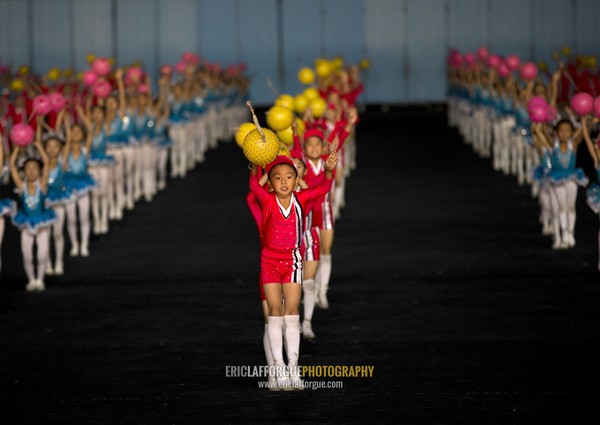 North Korean children performing with balloons during the Arirang mass games in may day stadium, Pyongan Province, Pyongyang, North Korea