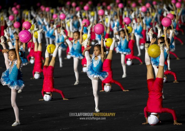 North Korean children gymasts performing with balloons during the Arirang mass games in may day stadium, Pyongan Province, Pyongyang, North Korea