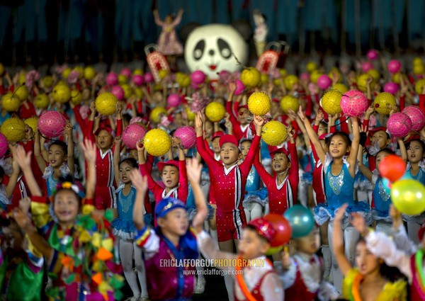 North Korean children performing with balloons during the Arirang mass games in may day stadium, Pyongan Province, Pyongyang, North Korea