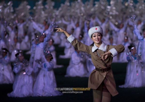 North Korean woman dressed as soldier during the Arirang mass games at may day stadium, Pyongan Province, Pyongyang, North Korea