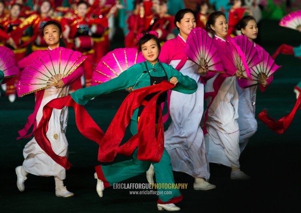 North Korean women dancing in choson-ot during the Arirang mass games in may day stadium, Pyongan Province, Pyongyang, North Korea