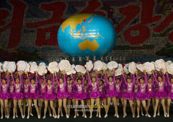 North Korean gymnasts in front of a world globe during the Arirang mass games in may day stadium, Pyongan Province, Pyongyang, North Korea