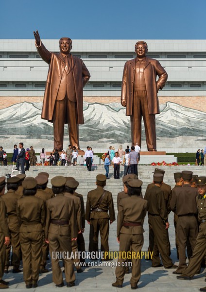 North Korean soldiers in front of the statues of the Dear Leaders in Mansudae Grand monument, Pyongan Province, Pyongyang, North Korea