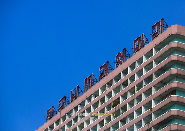 Building with propaganda slogan at the top, Pyongan Province, Pyongyang, North Korea