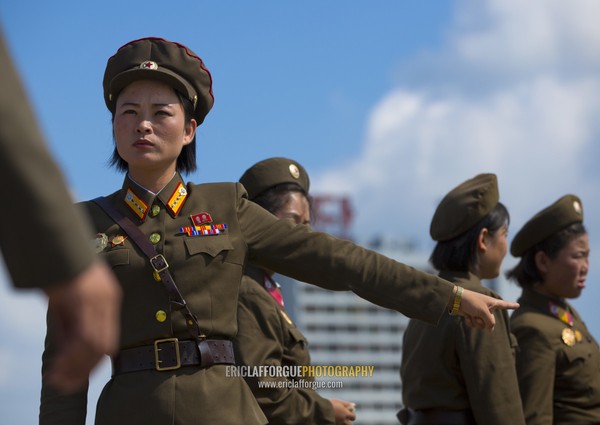 North Korean female soldier giving instructions, Pyongan Province, Pyongyang, North Korea