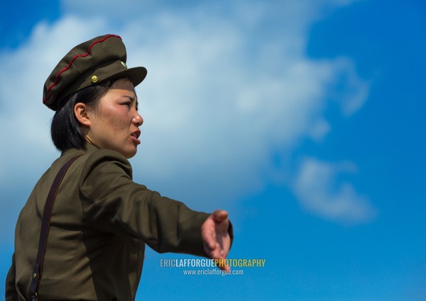 North Korean female soldier giving instructions, Pyongan Province, Pyongyang, North Korea