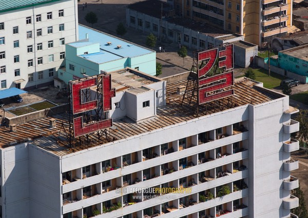 High angle view of buildings in the city center with the slogan union, Pyongan Province, Pyongyang, North Korea