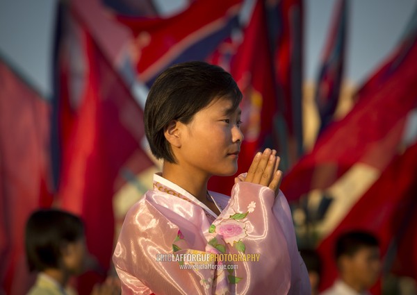 North Korean students during a mass dance performance on september 9 day of the foundation of the republic, Pyongan Province, Pyongyang, North Korea