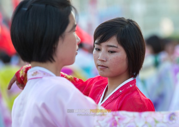 North Korean students during a mass dance performance on september 9 day of the foundation of the republic, Pyongan Province, Pyongyang, North Korea