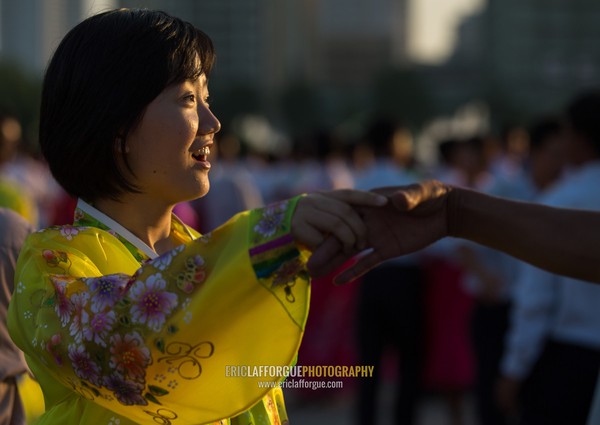 North Korean students during a mass dance performance on september 9 day of the foundation of the republic, Pyongan Province, Pyongyang, North Korea