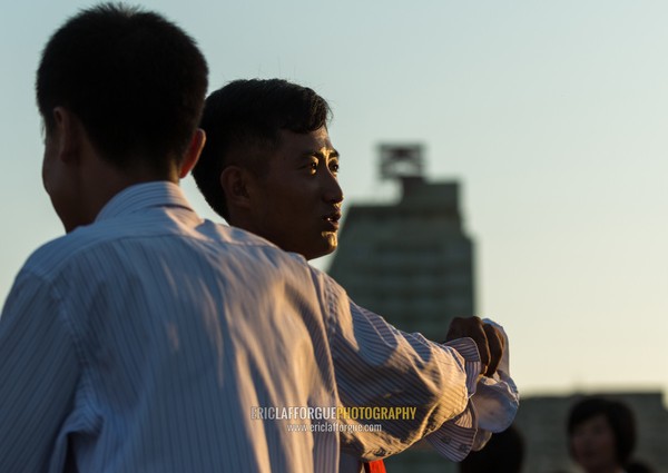 North Korean students during a mass dance performance on september 9 day of the foundation of the republic, Pyongan Province, Pyongyang, North Korea