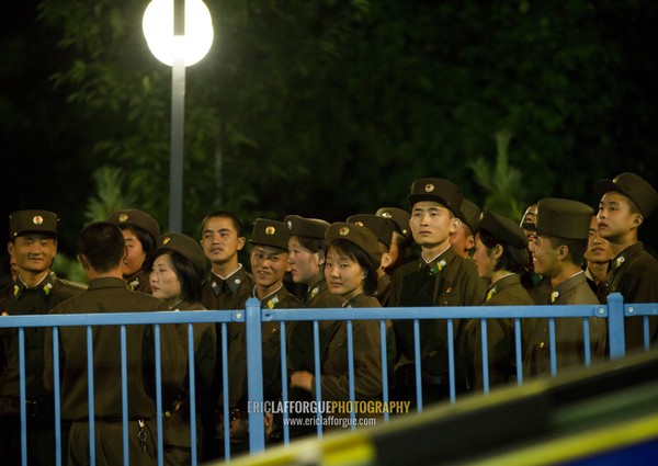 North Korean soldiers queueing for the roller coaster in Kaeson youth park, Pyongan Province, Pyongyang, North Korea